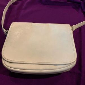 SOLD-Cream color shoulder bag with gold detail.